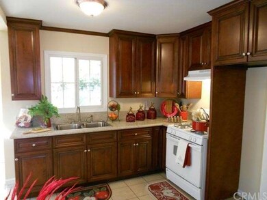 Kitchen View #4 showing new window and granite cou