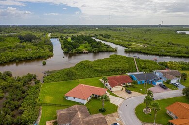 Large pie shaped corner lot that has beautiful wat