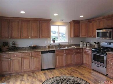 Generous counter space runs length of kitchen!