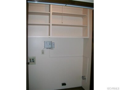 Laundry closet with built in shelves