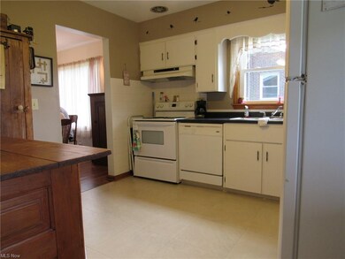 Bright, clean kitchen with ample cabinets.
