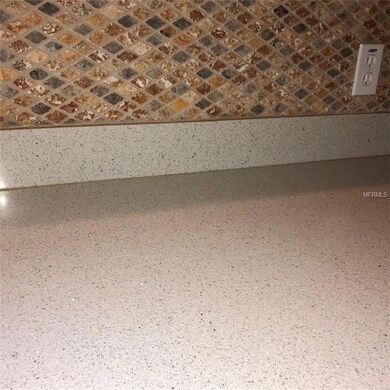 Tile back splash and Quartz counter tops.