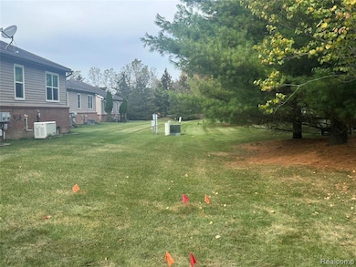 819 Chelsea Ridge Ct unit 7, Howell, MI 48843 - photo 5