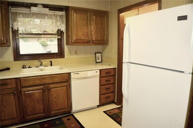 Yes, the refrigerator conveys. There is even a window so you can look outside when working at the sink.
