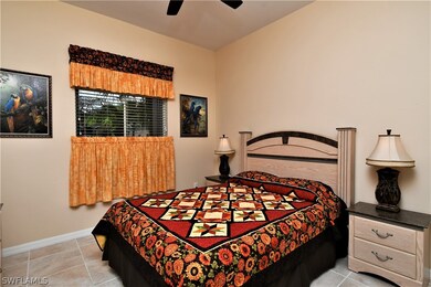 Spacious front bedroom- porcelain tiles on floor make for easy care