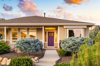 View of front of home featuring a porch and roof with shingles