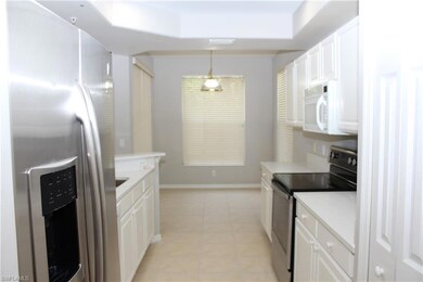 Kitchen featuring light tile patterned flooring, s