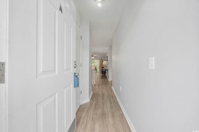 Hall with light wood-type flooring