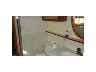 This full bath on the main floor adjoins two bedro