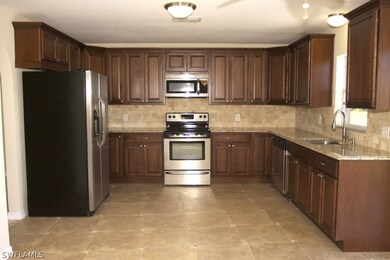 2426 NE Juanita Place, Cape Coral, FL 33909 - photo 7