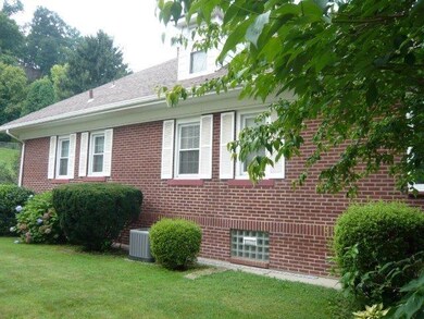 Solid brick house with central air.  Glass block w