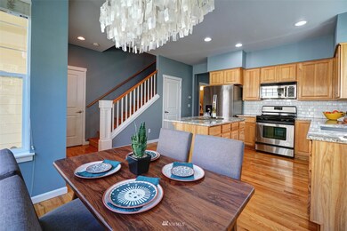 So much room to gather in kitchen! Spacious dining area.