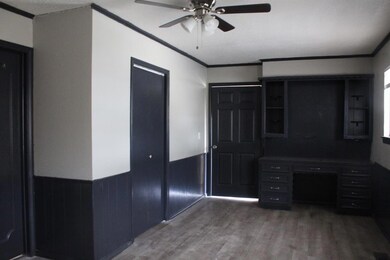Built in desk, storage with fireplace on the other