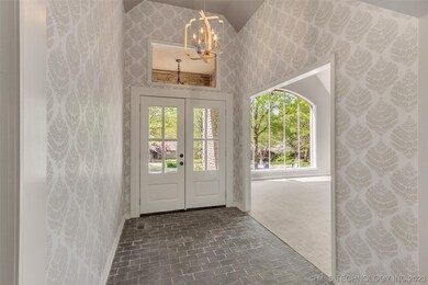 Beautiful entryway, formal dining on right.