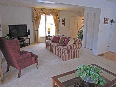 Great Room. Plush carpet, Elegant drapes and an op