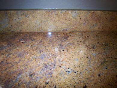 Gorgeous Granite Counters and Backsplash