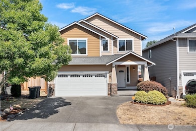 2 car garage, driveway & street parking!