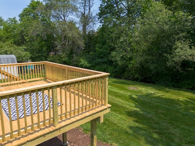 Enjoy the peaceful sounds of the Spoon Shop Brook from your deck