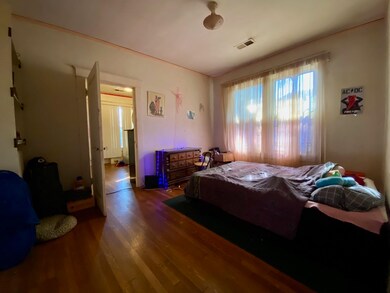 Bedroom featuring wood-type flooring