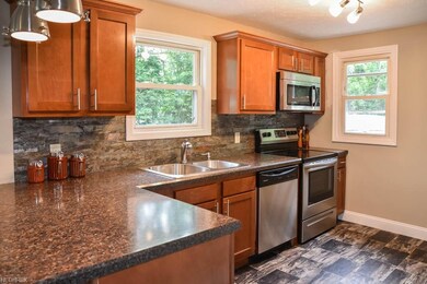 Stainless steel appliances in the kitchen.