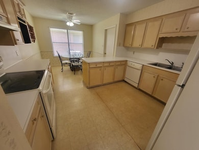 Large kitchen with separate dining area