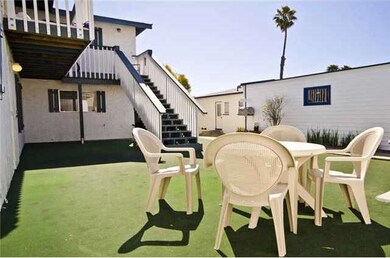 Patio area to enjoy sunshine while doing laundry