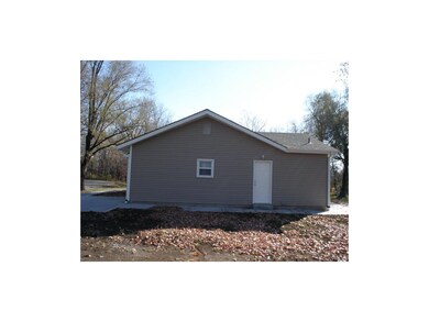 Walkway and door to garage