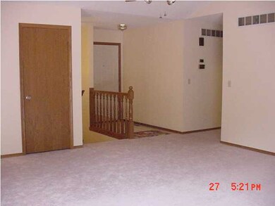 Living Room looking towards front door entry and 