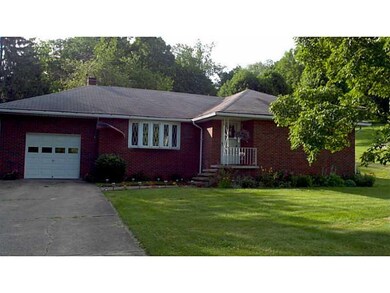 Exterior Front. Welcome to 1580 Rostraver Road!  T