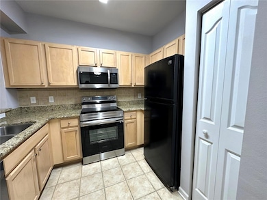 12843 Madison Pointe Cir unit 201, Orlando, FL 32821 - photo 5