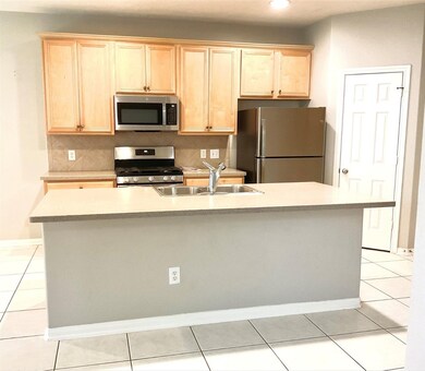 Modern kitchen featuring stainless steel appliance