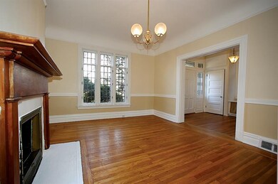 Dining room with leaded glass windows.