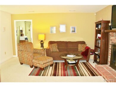Huge family room with wood burning fireplace.