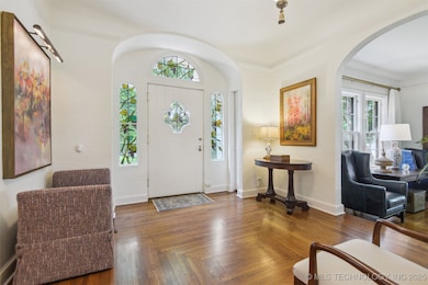 Welcoming foyer with beautiful hardwood floors