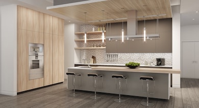 The kitchen features a striking design, equipped w