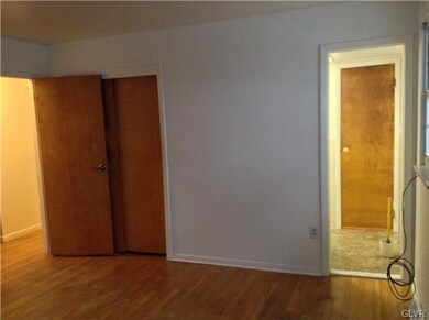 Master bedroom with door to bathroom and two close