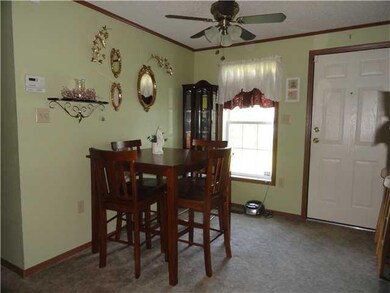 Dining Room. Dining area. Door leads to Three seas