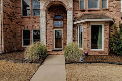 Property entrance with brick siding