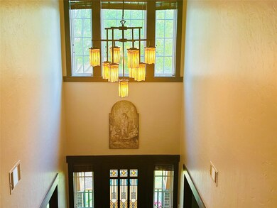 Dramatic chandelier in the entryway.
