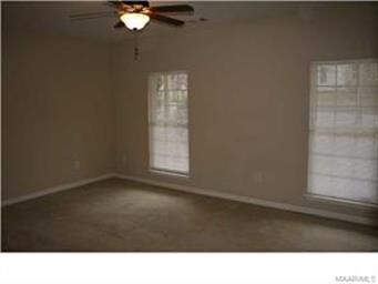 The downstairs master bedroom is spacious with gen