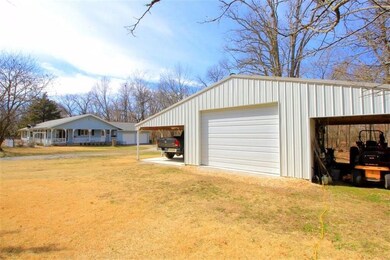 10.9 ACRE, PARK LIKE SETTING, ROOM FOR HORSES, NEWER 18 x 36 WORK SHOP WITH COVERED PARKING