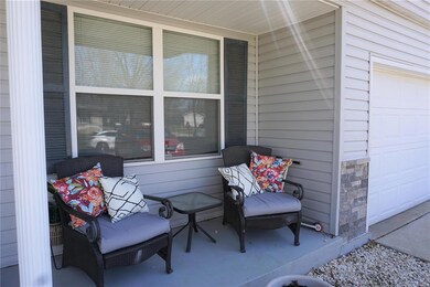 The covered porch welcomes you to this cute home!