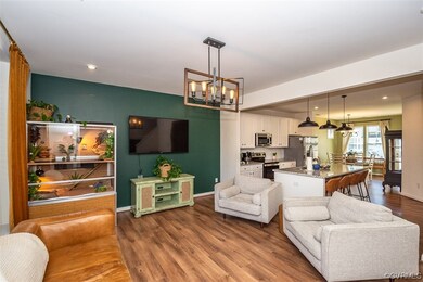 Living room featuring dark hardwood / wood-style f