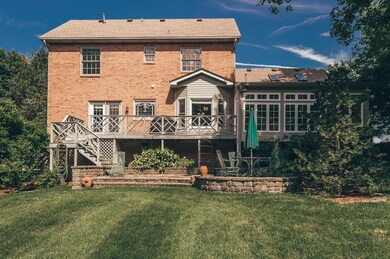 Professional landscaping with multiple settings to take in the beautiful backyard.