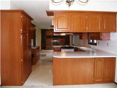 A view of therenovated kitchen and the family room