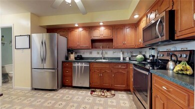 Kitchen with newer appliances and built in water f