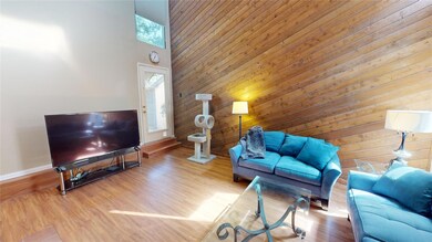Living room featuring hardwood / wood-style floori