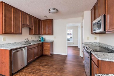 New cabinets, granite countertops, stainless steel sink and flooring.