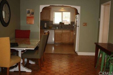 Floor plan is open from living room to kitchen.