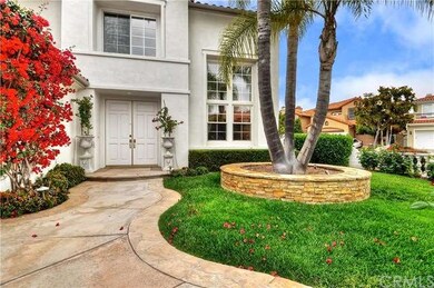 GORGEOUS BOUGANVILLA AND ROSES FILL THE YARD AT CE